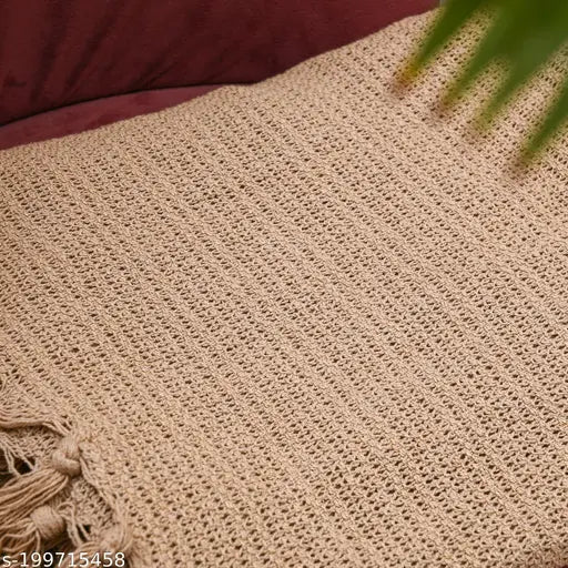 Soft beige knitted blanket on sofa, 1.5m x 1.25m, 50% cotton
