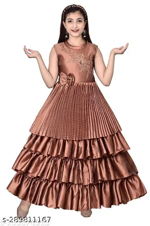Fancy, embroidered silk party dress with full skirt and sleeves. Brown hue