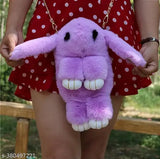 Purple plush toy bunny charm attached to a black strap crossbody bag, girl's fashion accessory