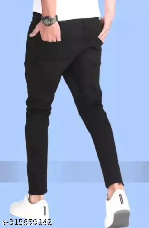 Black cotton blend ripped knee-slit jeans for men, size 36, on model