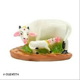 Handcrafted poly resin mother cow with calf, adorned with stones. Multicolored animal figurine for temple or home decor