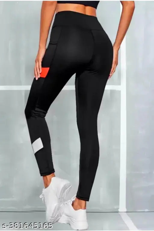 Black polyester Earth Joy womens jeggings for active bottomwear, gymwear, and sportswear. High-quality 4-way Lycra fabric ensures comfort and flexibility during exercise