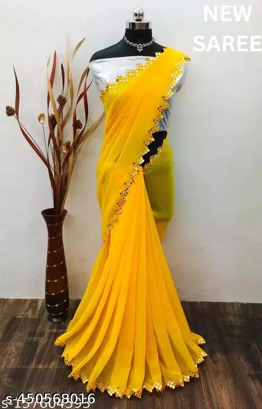 Yellow georgette cut saree with mirror work