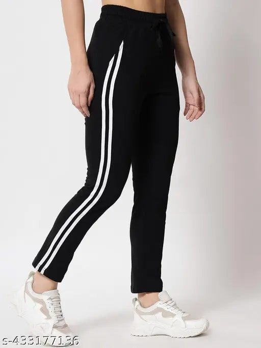 Black cotton joggers with contrasting white stripes and elastic waistband