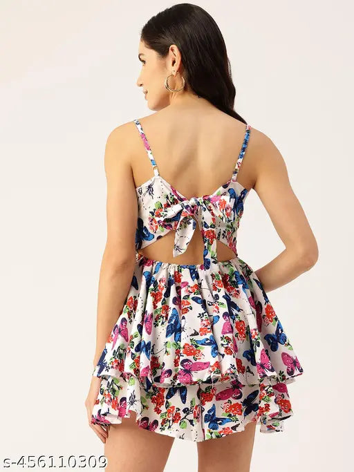 White and blue printed layered playsuit, sleeveless with shoulder straps, pockets. XS (32in bust, 36in length, 26in waist), polyester, machine wash
