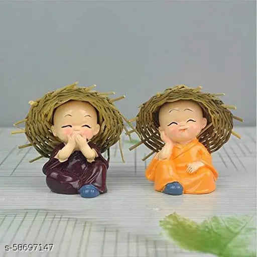 Handcrafted Indian Buddha monk figurines set for car dashboard, promoting peace and tranquility