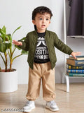 Boy in green bomber jacket standing near a potted plant