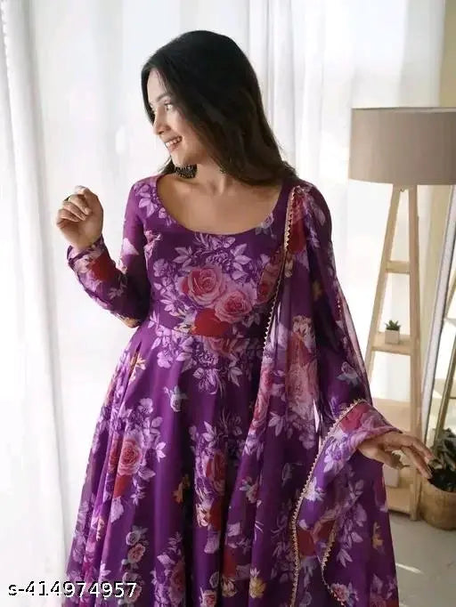 Trendy elegant georgette gown with long sleeves, printed net pattern. Women's fashion gown available in XS-XXXL sizes. Made in India