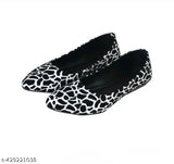 Flat shoes with animal print upper in a pair, black and white sole