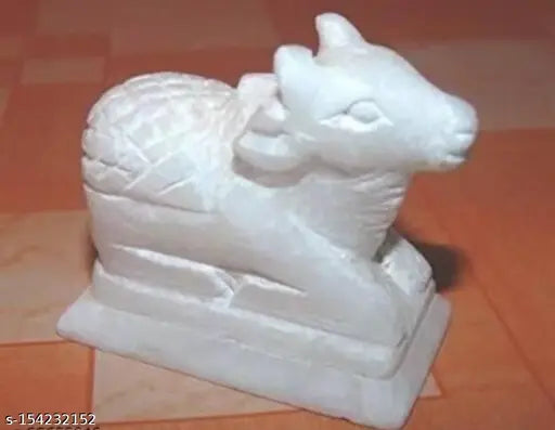White marble Nandi statue for puja and decor, 6cm high, handcrafted artifact from India