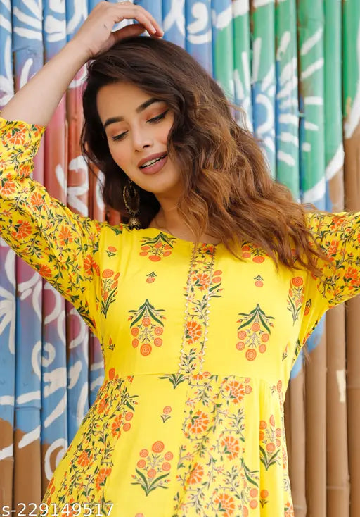 Yellow Rayon Anarkali for women with three-quarter sleeves, printed combo. Indian fashion garment on mannequin