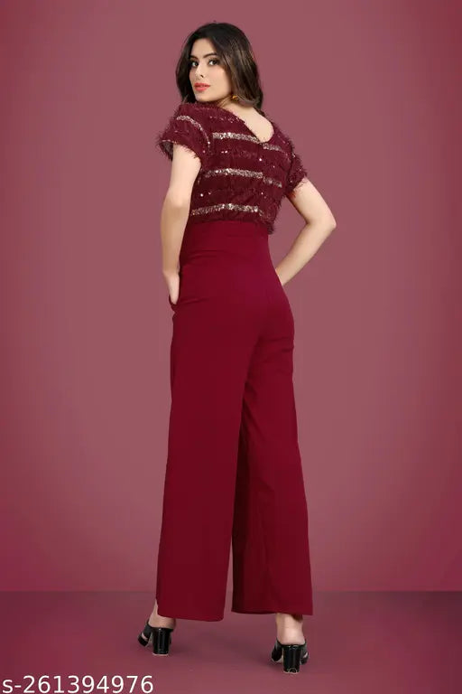 Maroon embellished lycra jumpsuit for women, intricately embroidered fashion piece on mannequin