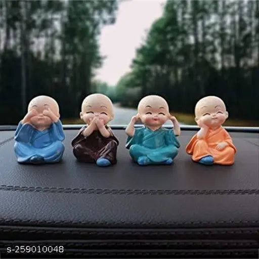 Handmade monk 4-piece set, intricate polyresin Buddha decor items for home, Indian art showpiece on table