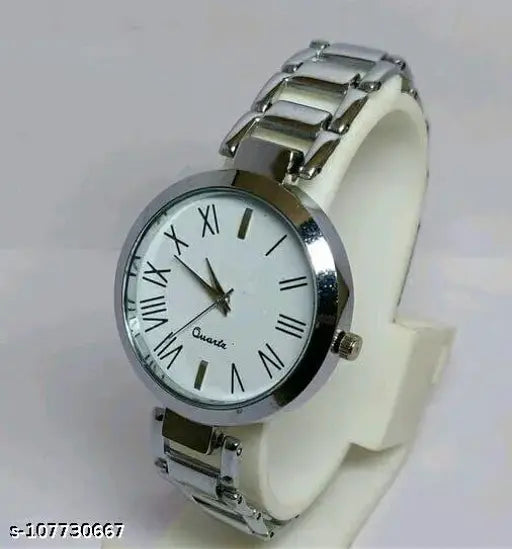 Silver women's watch with white face and black numbers