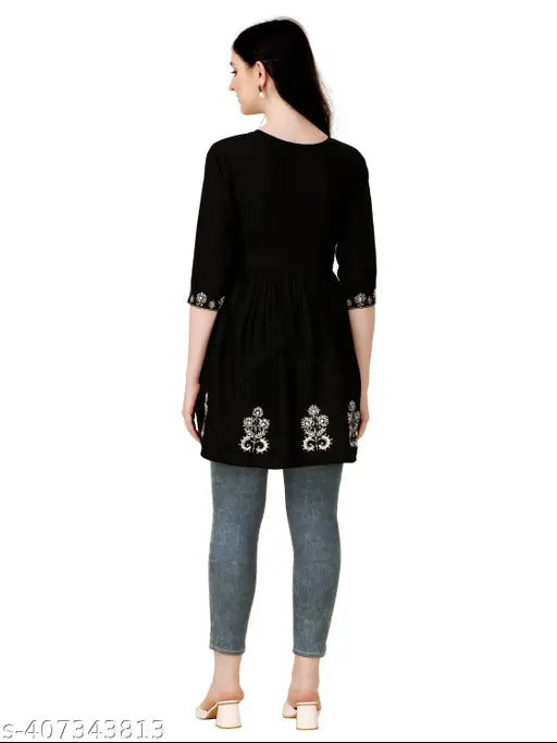 Embroidered rayon A-line tunic for women, three-quarter sleeves, stylish contemporary fashion accessory