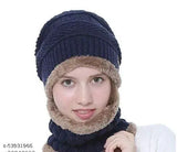 A dark blue fleece beanie with a teddy bear motif
