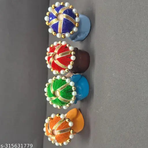 Monk-themed poly resin showpiece set (Blue, Brown, Orange, Sky Blue), 40mm x 60mm x 60mm, handcrafted Indian home decor