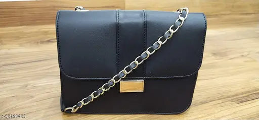 Black synthetic leather shoulder bag with chain sling strap for girls or women
