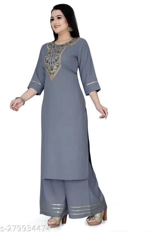 Grey poly blend embroidered kurti & palazzo set for women by NirFashion. Solid grey 3/4 sleeve straight kurti and wide-leg Palazzos with sequence and gota patti lace details. Lightweight, comfortable, and suitable for various accessories and footwear. Handcrafted in India