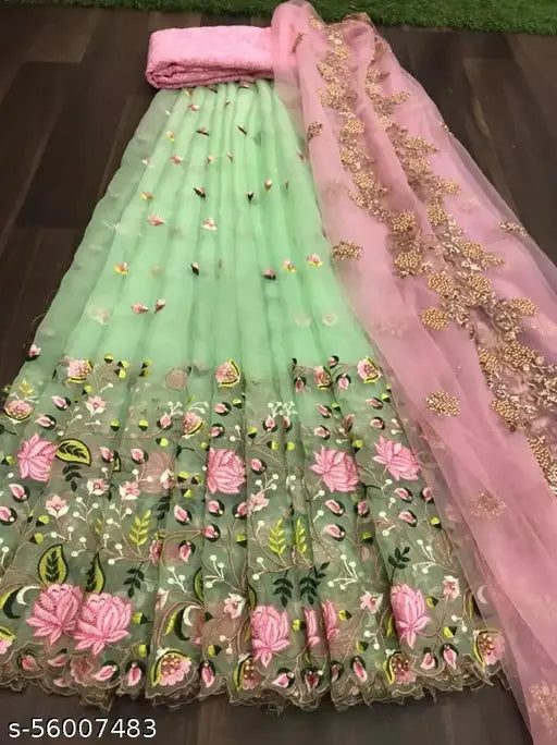 Embroidered dupion silk and net Lehenga with cut work broder, semi-stitched; heavy Bangalore silk blouse with multi thread work. Indian bridal topwear and dupatta set on display