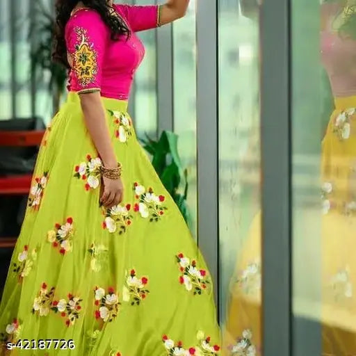 Silk and net embellished Aishani Ensemble women's lehenga set, featuring choli top and dupatta with intricate embroidery. Semi-stitched size: 41 in waist, 43 in length. Indian handcrafted attire on display