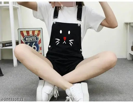 Black cotton blend printed net jumpsuit for women, short sleeves and one-piece design from DUNGREE brand, popular fashion choice for casual wear