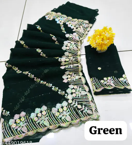 Black sari with detailed embroidery and borders, possibly traditional Indian wear