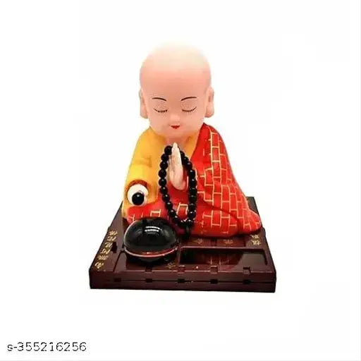 Multicolor plastic Buddha statue with solar-powered moving head and hand, enhancing home, office, or car dashboard decor for wealth and prosperity