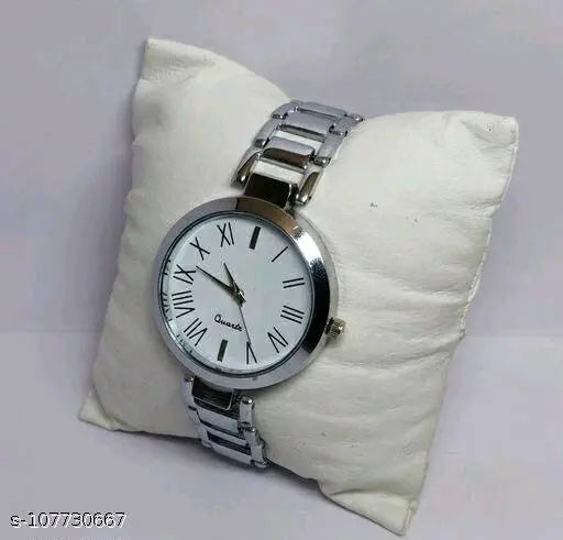 Women's watch with silver band and round face, featuring black numbers and hands