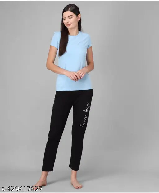 Dark blue cropped trousers and matching short-sleeved top, featuring subtle striped details