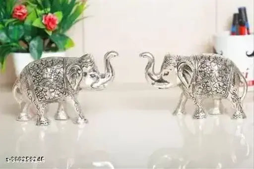 Silver-plated Metal Elephant Statue Set (2 pcs), small size, ideal for home or office decor, symbolizing wisdom and strength