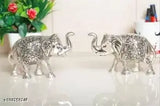 Silver-plated Metal Elephant Statue Set (2 pcs), small size, ideal for home or office decor, symbolizing wisdom and strength