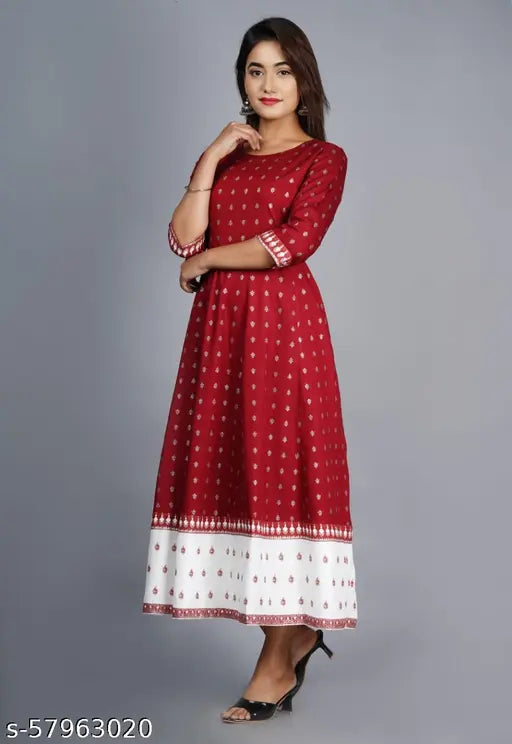 Black printed rayon straight kurti with three-quarter sleeves, featuring an ethnic design from India's latest fashion collection