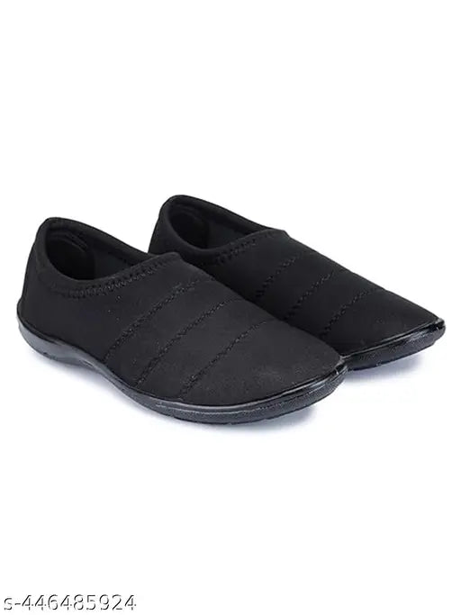 Black canvas women's shoes with slip-on PVC sole, available in three sizes: IND-6, IND-7, IND-8