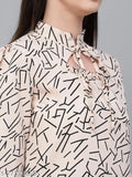 Beige and black abstract print polyester smart casual top, long sleeves, sophisticated mandarin collar, full puff sleeves, India-origin fashion wear