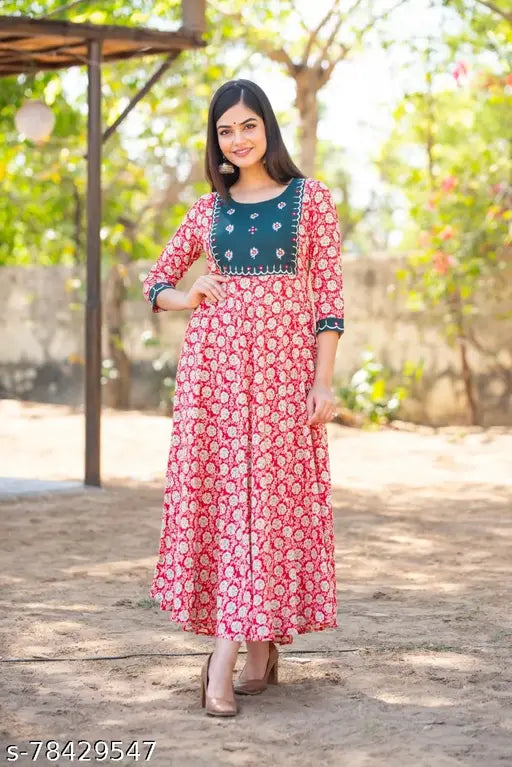 Red embroidered kameez with flared sleeves and hem, traditional ethnic wear for women