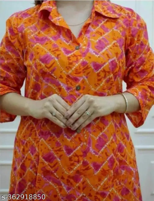 Orange New rayon kurta with palazzo bottoms, printed net design - high-quality Indian fashion