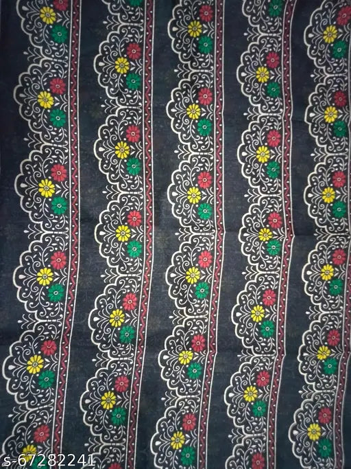 Multi-colored embroidered border with paisley designs on a plain background
