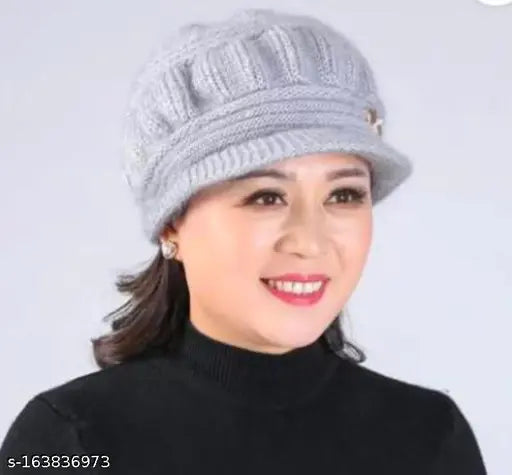 Gray wool head wrap with a button on the top