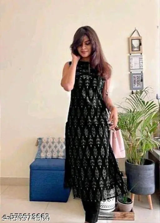 Black rayon sleeveless straight kurti by Shikha Fashions, features printed design for women's ethnic style