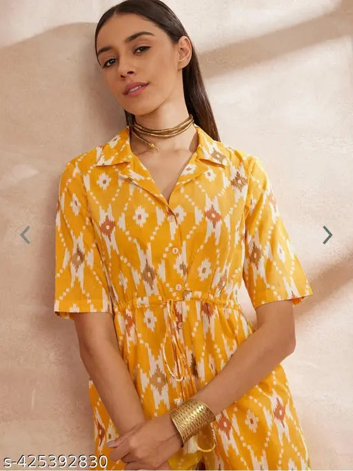 YELLO rayon printed jumpsuit on model, vibrant yellow short-sleeved outfit for women's fashion