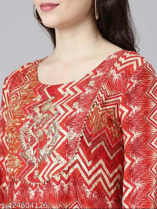 Red and gold patterned sharara suit with flared sleeves