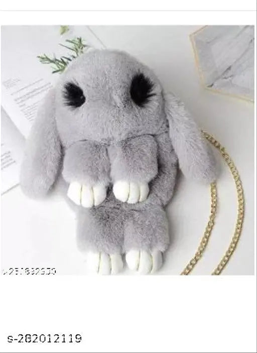 Grey fluffy plush toy in a grey bag, with its arms crossed over it