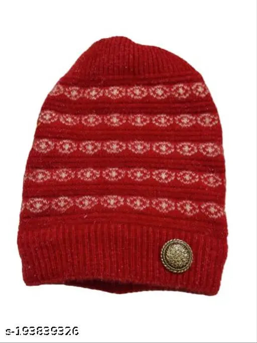 A red knitted winter hat with a button on top