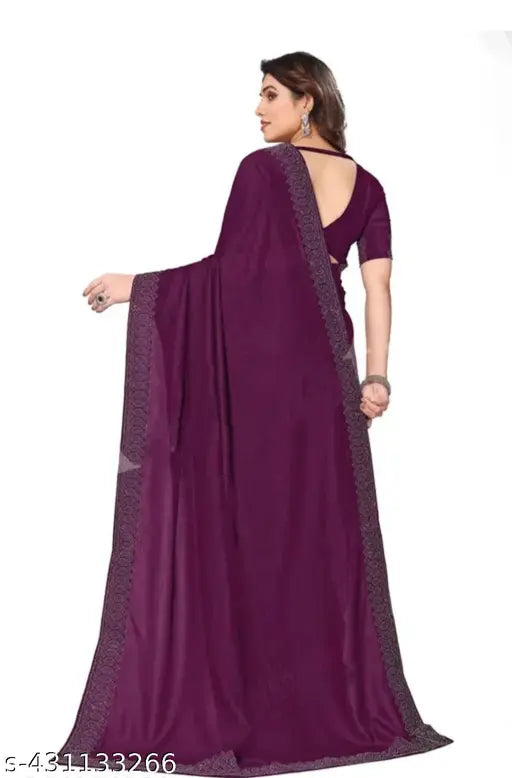 Georgette saree with dupion silk running blouse, solid pattern in vibrant Indian hues on hanging rack