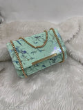 Leather sling bag, small size, casual design, featuring a chain-link strap and multiple card slots