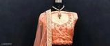 Orange embroidered Lehenga Choli set with heavy net fabric, ruffled design and satin blouse. Indian bridal wear including dupatta with lace border, semi-stitched, unstitched, and free size available