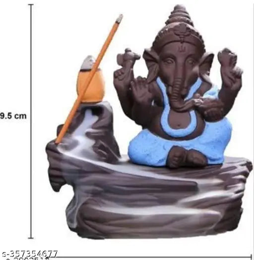 The alt text for this product could be: "Ganesh ji figurine, decorative, ceramic material