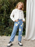Girl wearing denim overalls, standing outdoors