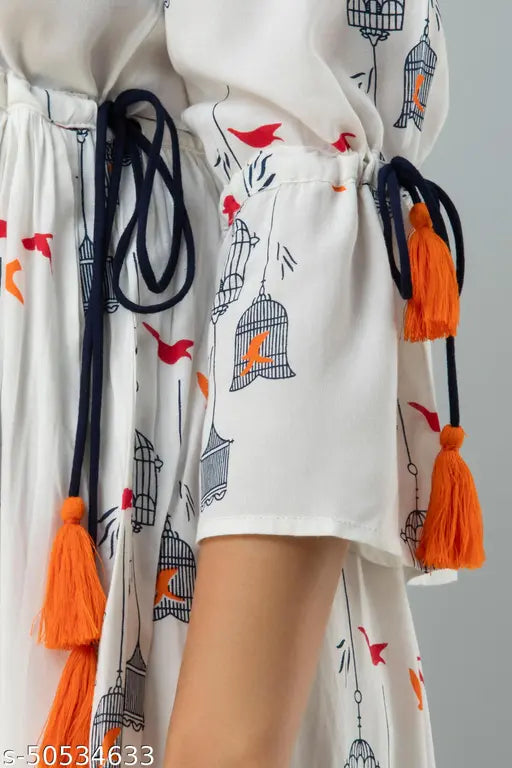 White bird cage print rayon flared long kurta, three-quarter sleeves with tassels detailing. Indian ethnic wear featuring a quirky bird and cage pattern. Perfect for stylish, airy summer outfit. Size XXL (Bust 44 in, Length 48 in)